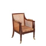 A REGENCY MAHOGANY AND CANEWORK LIBRARY BERGERE