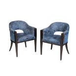 A PAIR OF UPHOLSTERED TUB CHAIRS