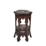 MANNER OF LIBERTY & CO : A MOORISH HEXAGONAL OCCASIONAL TABLE