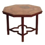 AN OCTAGONAL OCCASIONAL TABLE IN THE ARTS AND CRAFTS TASTE