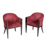 A PAIR OF UPHOLSTERED TUB CHAIRS