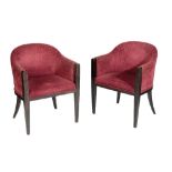 A PAIR OF UPHOLSTERED TUB CHAIRS