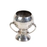 AN IRISH ARTS AND CRAFTS SILVER TYG BY WEST & SON,