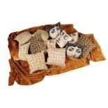 ATELIER FORNASETTI: A SET OF FOUR CUSHIONS