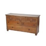 * NIGEL GRIFFITHS: A PAIR OF HANDMADE OAK LOW CHESTS OF DRAWERS
