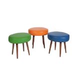 THREE OVAL CUSHIONED STOOLS