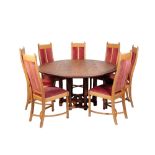 * ADRIAN KING FOR WAYWOOD FURNITURE: A CIRCULAR DINING TABLE AND EIGHT CHAIRS