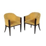 A PAIR OF UPHOLSTERED TUB CHAIRS