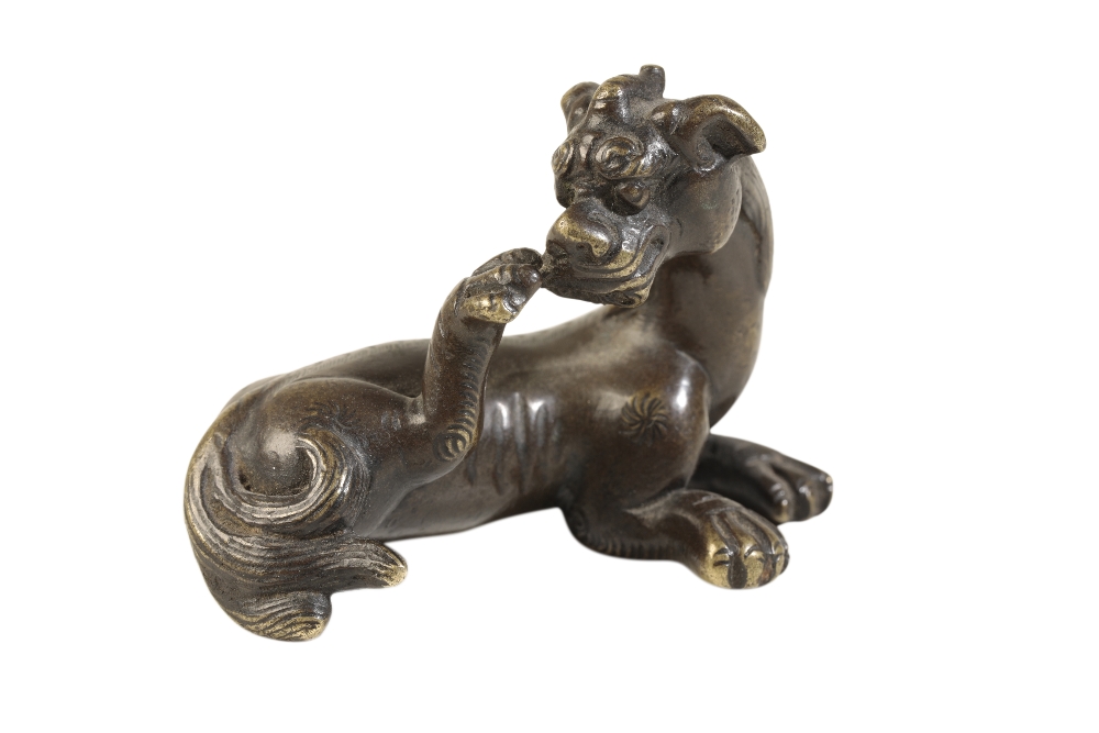 BRONZE 'BUDDHIST LION' SCROLL WEIGHT, MING DYNASTY