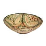 UNUSUAL SANCAI-GLAZED ISLAMIC BOWL, AFGHANISTAN 12TH CENTURY