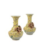 PAIR OF FAMILLE ROSE YELLOW-GROUND VASES, QIANLONG SEAL MARKS BUT 19TH CENTURY