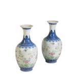 PAIR OF BLUE AND WHITE FAMILE ROSE VASES