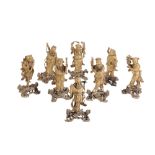 SET OF EIGHT GILT-LACQUER FIGURES OF THE DAOIST IMMORTALS, LATE QING / REPUBLIC PERIOD