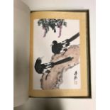 TWO BOOKS OF CHINESE PAINTINGS