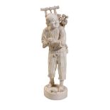 LARGE JAPANESE CARVED IVORY OKIMONO OF A FLOWER SELLER, SIGNED MITSUHIRO MEIJI PERIOD