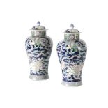 IMPRESSIVE PAIR OF FAMILLE ROSE 'PHOENIX' JARS AND COVERS, QING DYNASTY, 19TH CENTURY