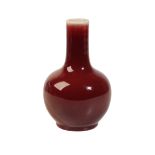 SMALL OX-BLOOD GLAZE BOTTLE VASE, LATE QING / REPUBLIC PERIOD