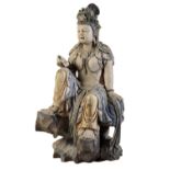 RARE POLYCHROME-PAINTED CARVED WOOD FIGURE OF GUANYIN, MING DYNASTY