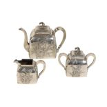 CHINESE EXPORT THREE PIECE SILVER TEA SERVICE, MARK OF WANG HING & CO.