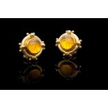 A PAIR OF 18CT YELLOW GOLD AND HAND CARVED CITRINE EARRINGS BY ELIZABETH LOCKE