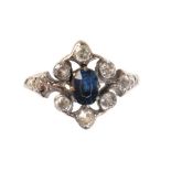 A SAPPHIRE AND DIAMOND CLUSTER RING