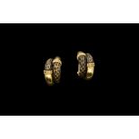 A PAIR OF VINTAGE BOUCHERON PARIS BRONZE AIRAIN AND 18CT YELLOW GOLD CLIP EARRINGS