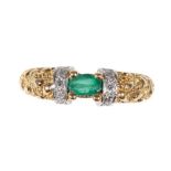 AN EMERALD AND DIAMOND RING