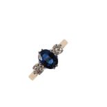 A SAPPHIRE AND DIAMOND THREE STONE RING