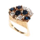 A MODERNIST SAPPHIRE AND DIAMOND CLUSTER RING