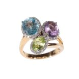 A TRIPLE-GEM SET DRESS RING