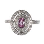 A PINK SAPPHIRE AND DIAMOND TARGET RING
