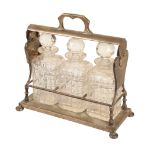 A VICTORIAN ELECTROPLATED THREE BOTTLE TANTALUS,