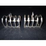 A PAIR OF SILVER FIVE-BAR TOAST RACKS, (c.3.6oz)