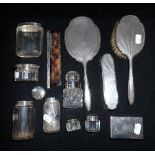 A SILVER-BACKED DRESSING TABLE SET, by Albert Carter, and a collection of silver-mounted glass