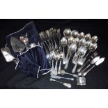 A COLLECTION OF MIXED SILVER PLATED FLATWARE, a silver napkin ring and three silver utensils (c.1.