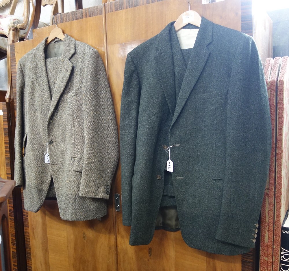 A 1960'S GREEN WOOLLEN THREE PIECE MAN'S SUIT and a similar tweed suit