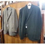 A 1960'S GREEN WOOLLEN THREE PIECE MAN'S SUIT and a similar tweed suit