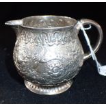 A GEORGE II SILVER CREAM JUG, maker 'IS' pellet below, London, 1735, 7cm high (c.3.9oz)