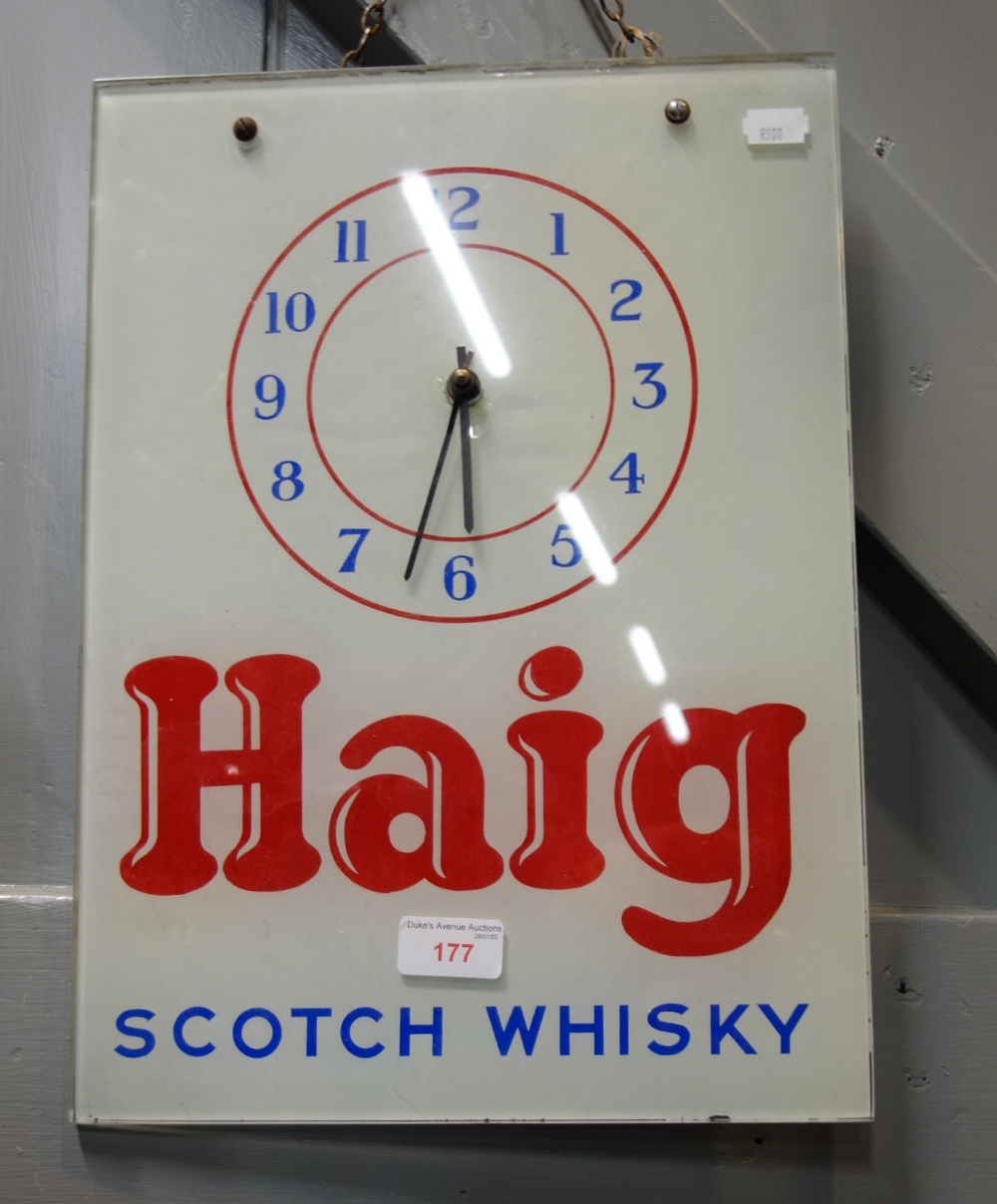 A VINTAGE HAIG SCOTCH WHISKY ADVERTISING CLOCK (later movement)