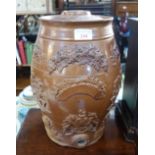 A 19TH CENTURY GLAZED STONEWARE CISTERN with relief moulded motifs, 35cm high