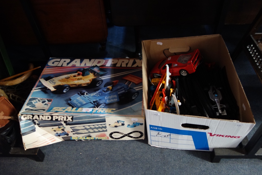 A SCALEXTRIC GRAND PRIX SET AND TRACK and a Burago Ferrari F40