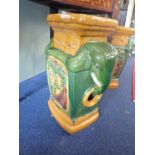 A PAIR OF LARGE CHINESE GLAZED EARTHENWARE GARDEN SEATS with elephant head handles and pierced