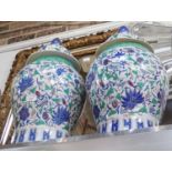 A LARGE PAIR OF ORIENTAL LIDDED URNS, 52cm high