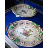 A PAIR OF WORCESTER RETICULATED OVAL DISHES, CIRCA 1780, with naturalistic handles, painted in
