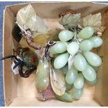 A COLLECTION OF ORIENTAL 'JADE' AND POLISHED HARD STONE FRUIT