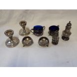 A COLLECTION OF MIXED SILVER, including a pair of dwarf silver candlesticks (filled) (c.4.4oz)