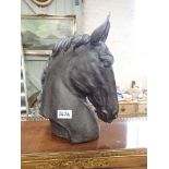 A CONTEMPORARY BRONZE EFFECT (LIGHT RESIN) STUDY OF A HORSE'S HEAD, 33cm high