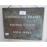 A VINTAGE BRONZE SIGN, 'HASTINGS AND THANET BUILDING SOCIETY LOCAL OFFICE' 25.5cm wide