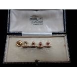 FIVE 9CT GOLD GENTLEMAN'S DRESS STUDS, in a presentation case, approx 3.9grams total weight