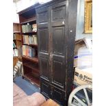 A GEORGE III FULL HEIGHT PINE CORNER CUPBOARD with original distressed brown painted finish on the